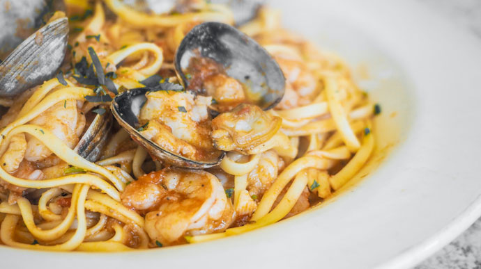 pasta with mussels on the half shell at restaurant on the Cape