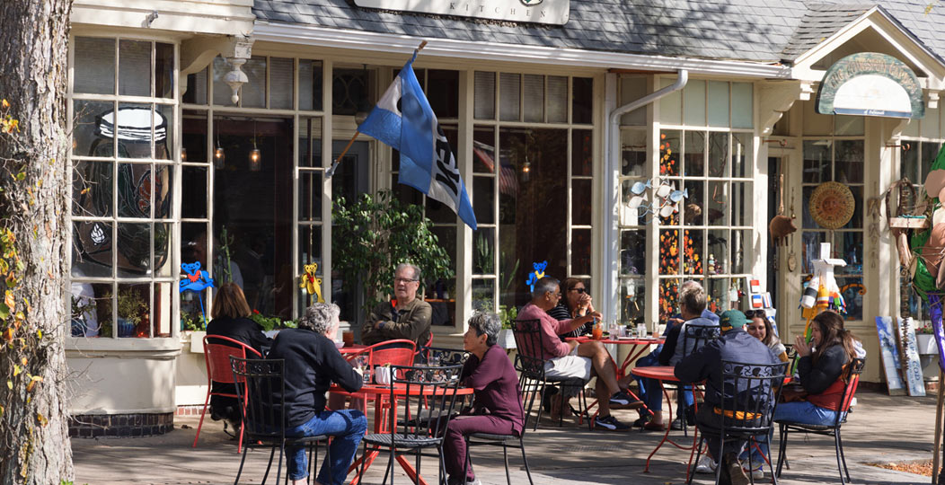 local cape cod residents enjoying food outside of the Pickle Jar Kitchen in Falmouth