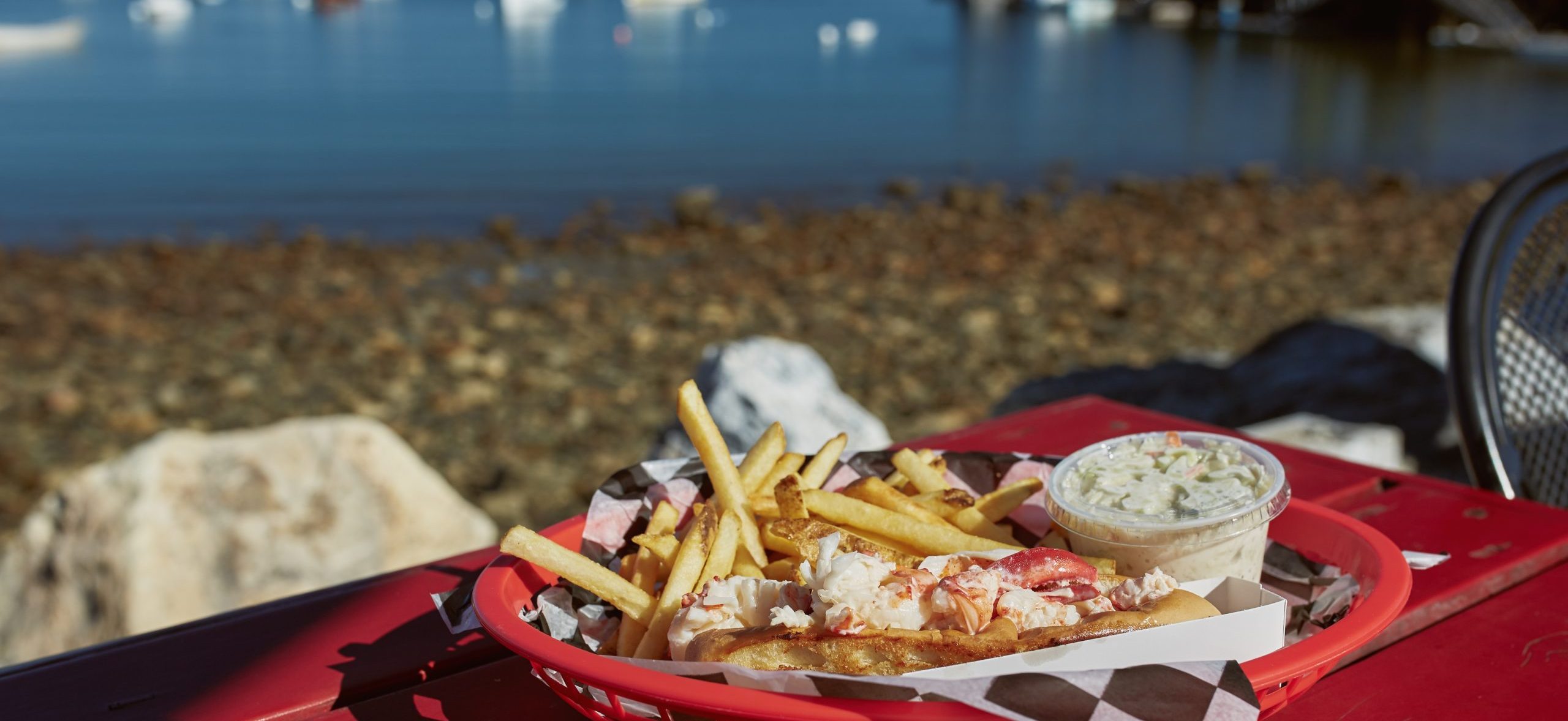 Diners relish clam chowder served in a warm sourdough bowl at Pier 39.